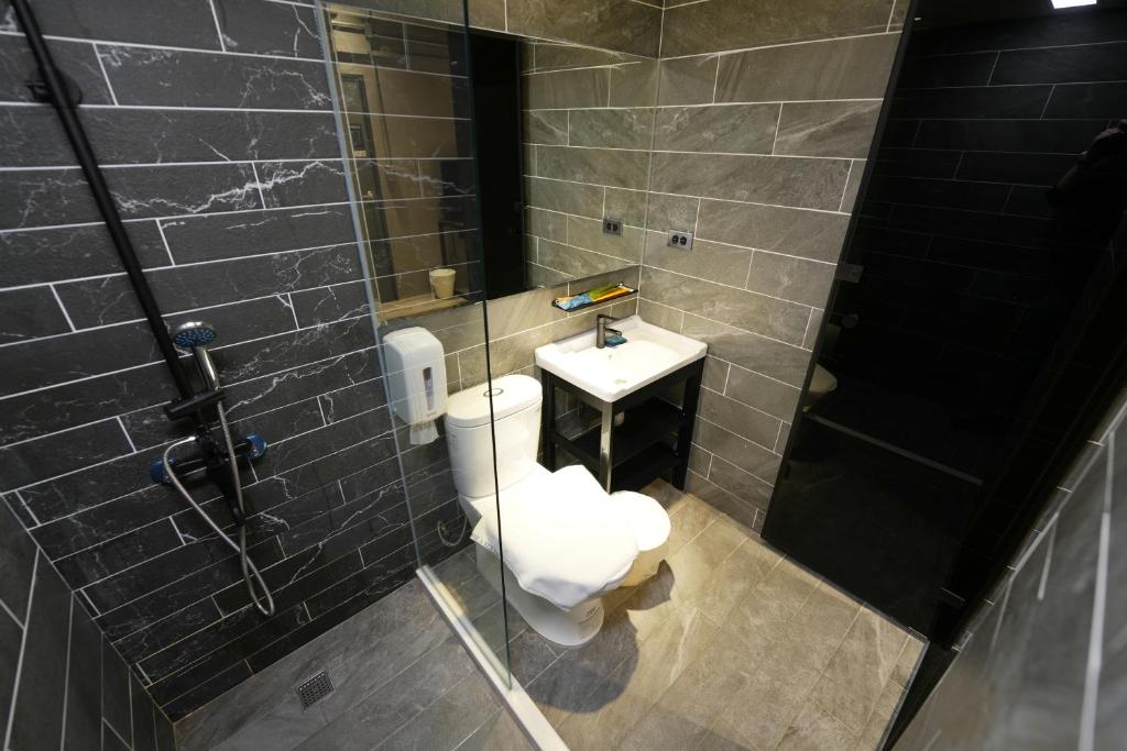 Koupelna v ubytování Meworld Hotel - Songshan