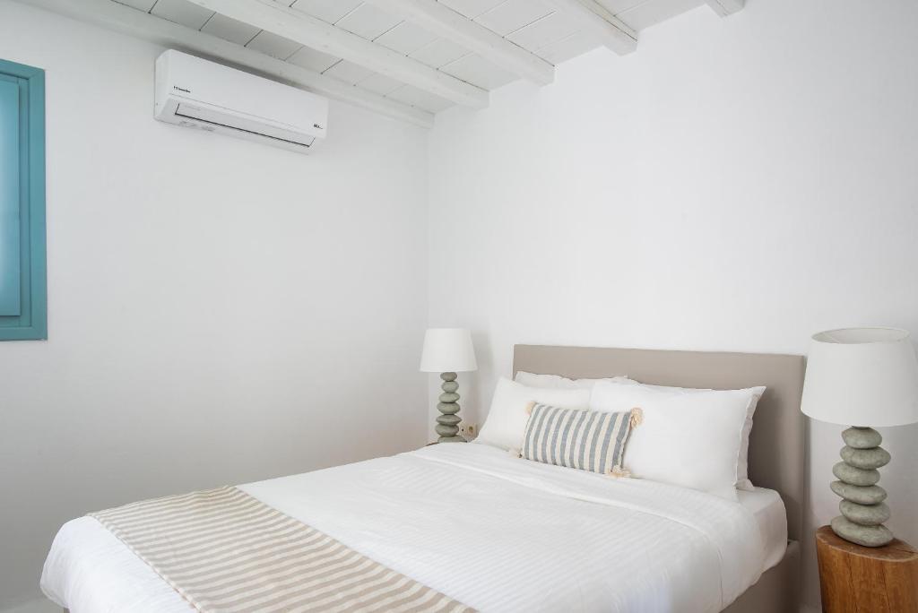 Postel nebo postele na pokoji v ubytování Villa Hola Mykonos