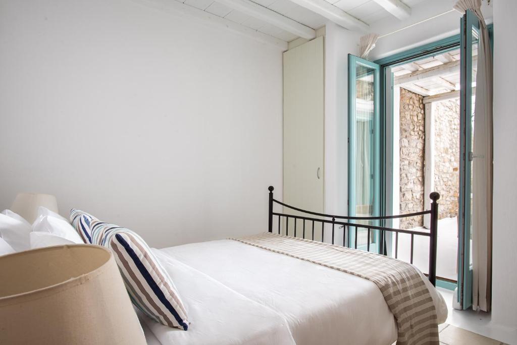 Postel nebo postele na pokoji v ubytování Villa Hola Mykonos