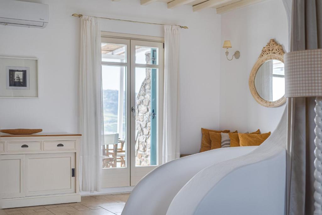 Postel nebo postele na pokoji v ubytování Villa Hola Mykonos