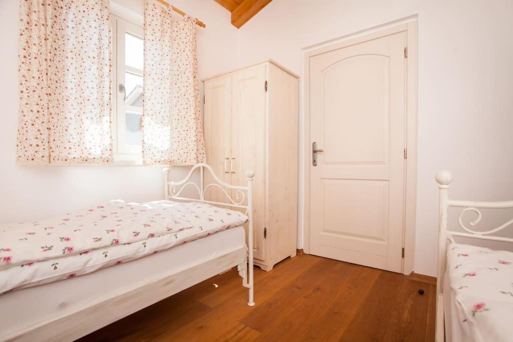 Postel nebo postele na pokoji v ubytování Villa Petra
