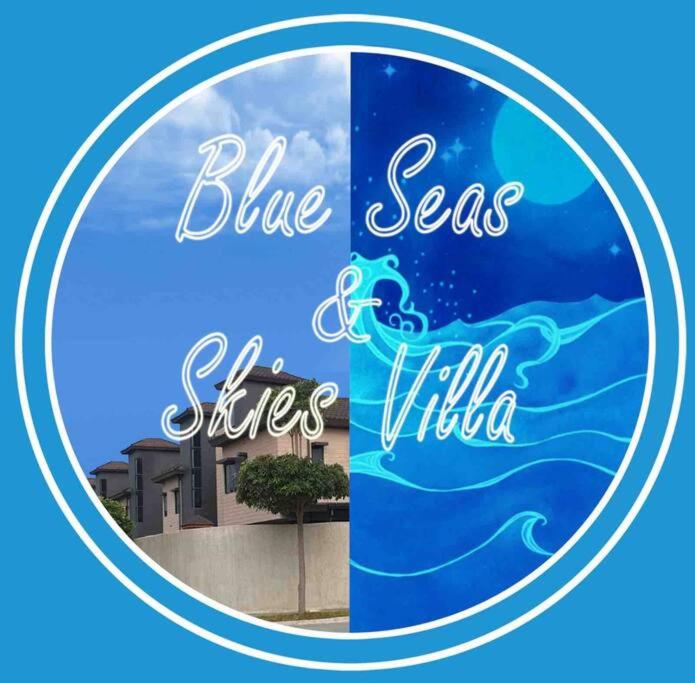 a sign with the words blue seas and skies wildlife at 5BR w/ Covered Pool, Jacuzzi, & Gazebo 