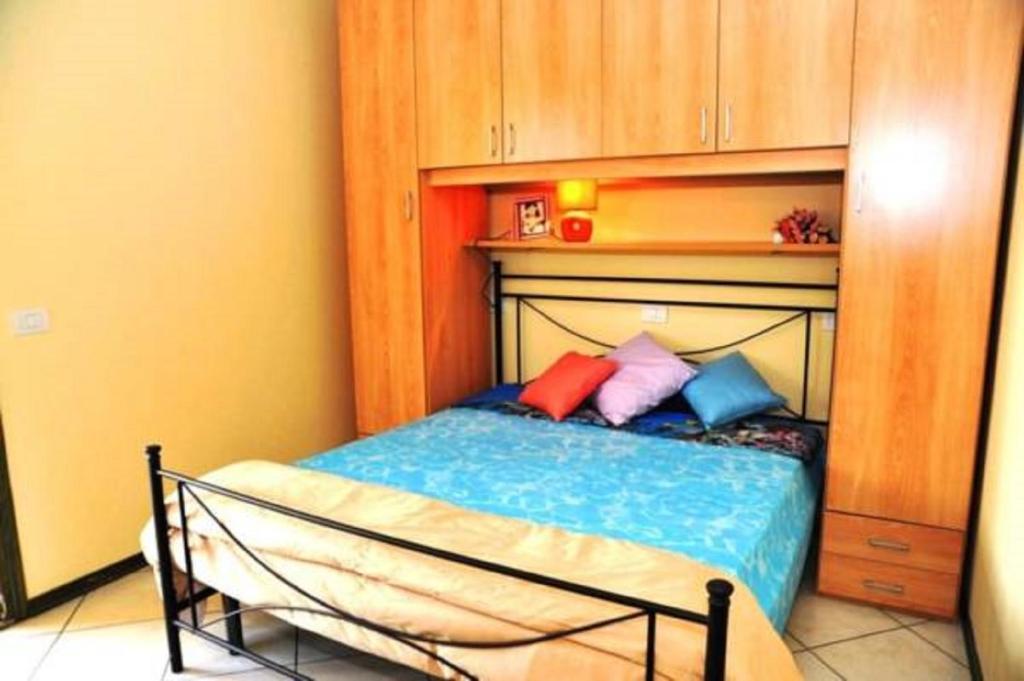 A bed or beds in a room at Pomposa Residence