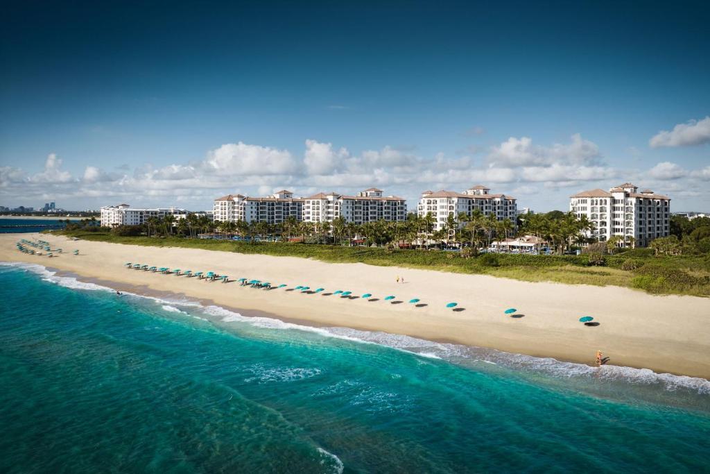 an aerial view of a beach with buildings at Marriott's Ocean Pointe in Palm Beach Shores