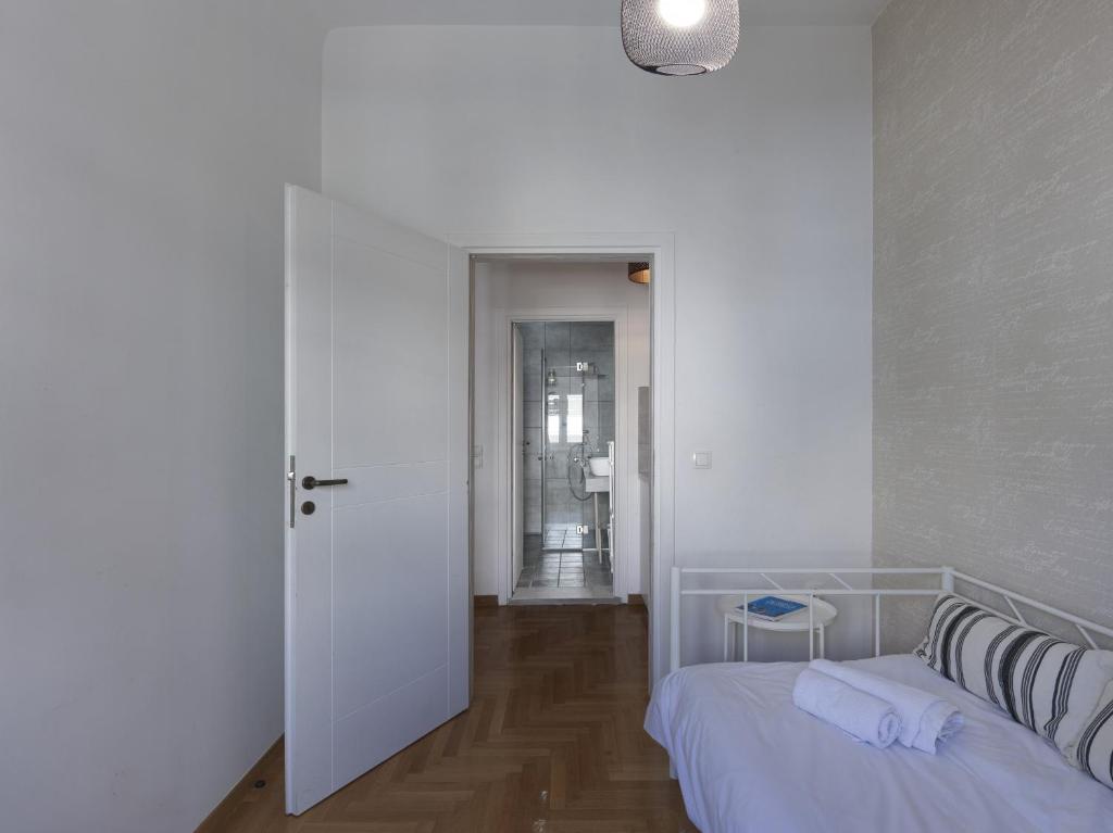 Posteľ alebo postele v izbe v ubytovaní Beautiful Athenian apartment next to the center