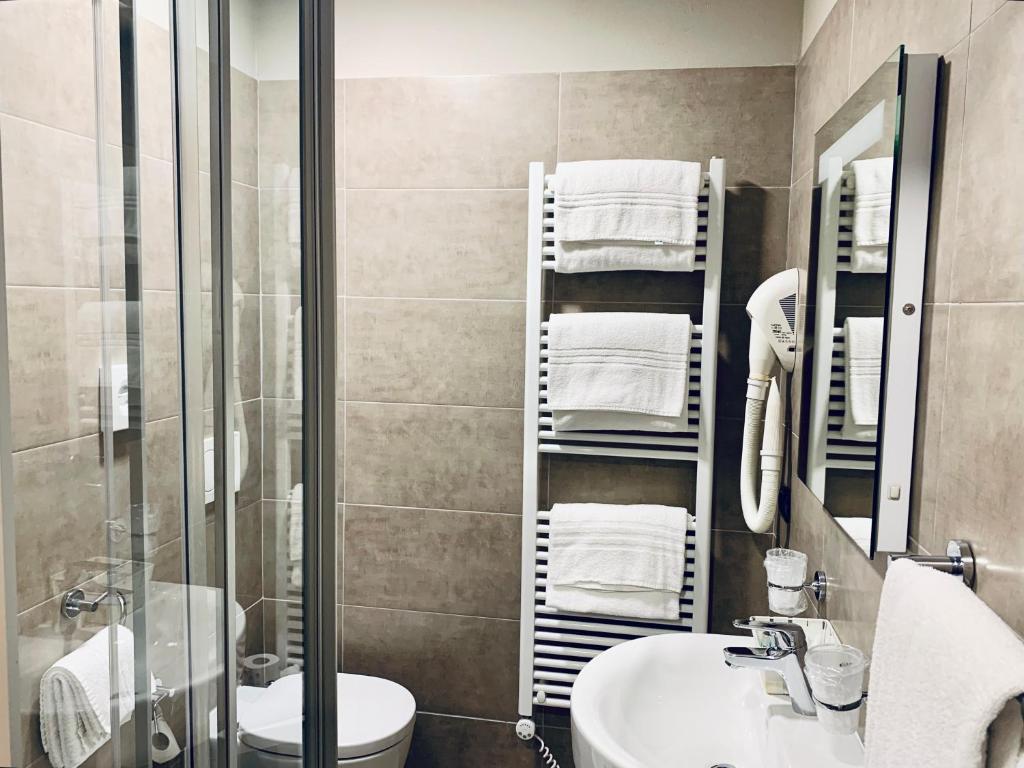 Koupelna v ubytování Hotel Corallo