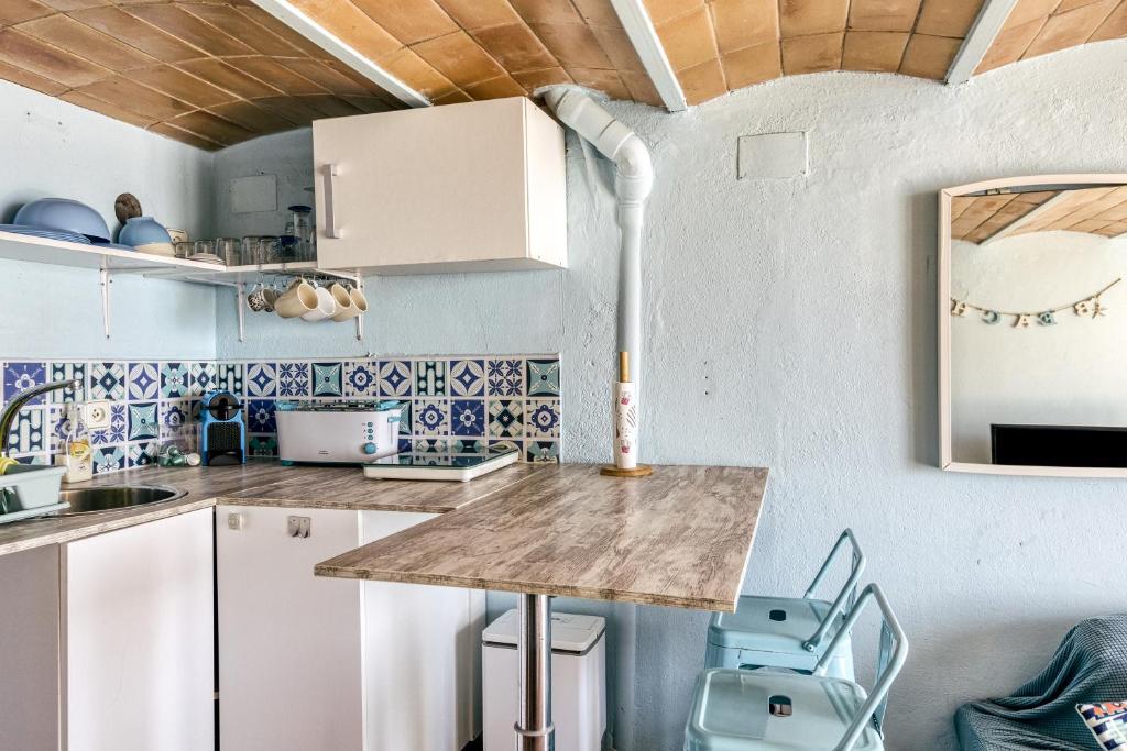 Kuchyň nebo kuchyňský kout v ubytování Loft Calella de Palafrugell