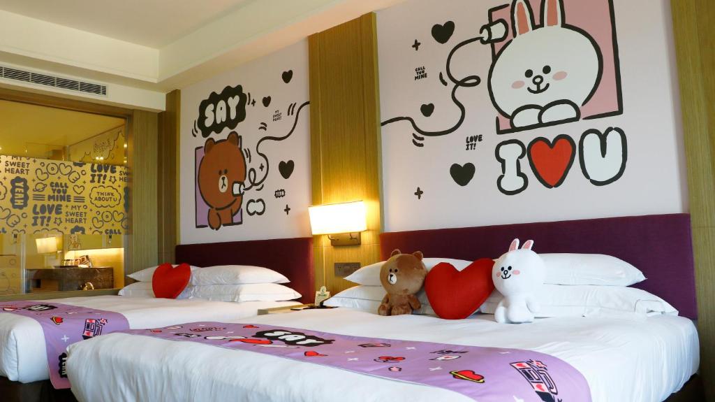 Postel nebo postele na pokoji v ubytování Fullon Hotel LihPao Resort