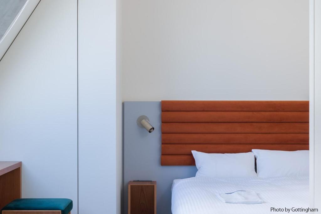 KIRO 広島 by THE SHARE HOTELS にあるベッド