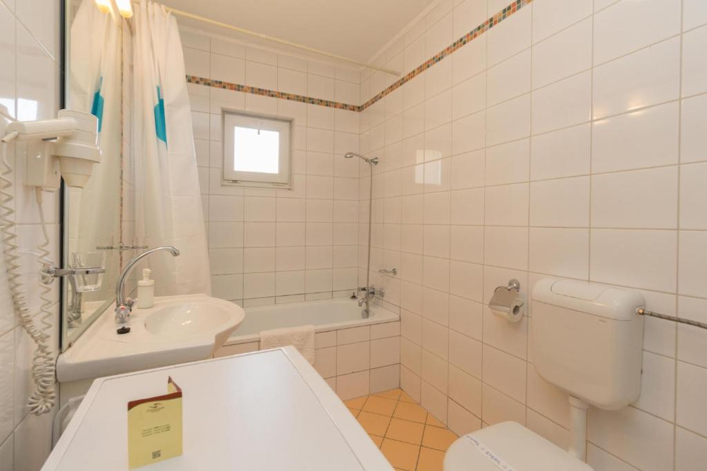 Kúpeľňa v ubytovaní Premium Apartments