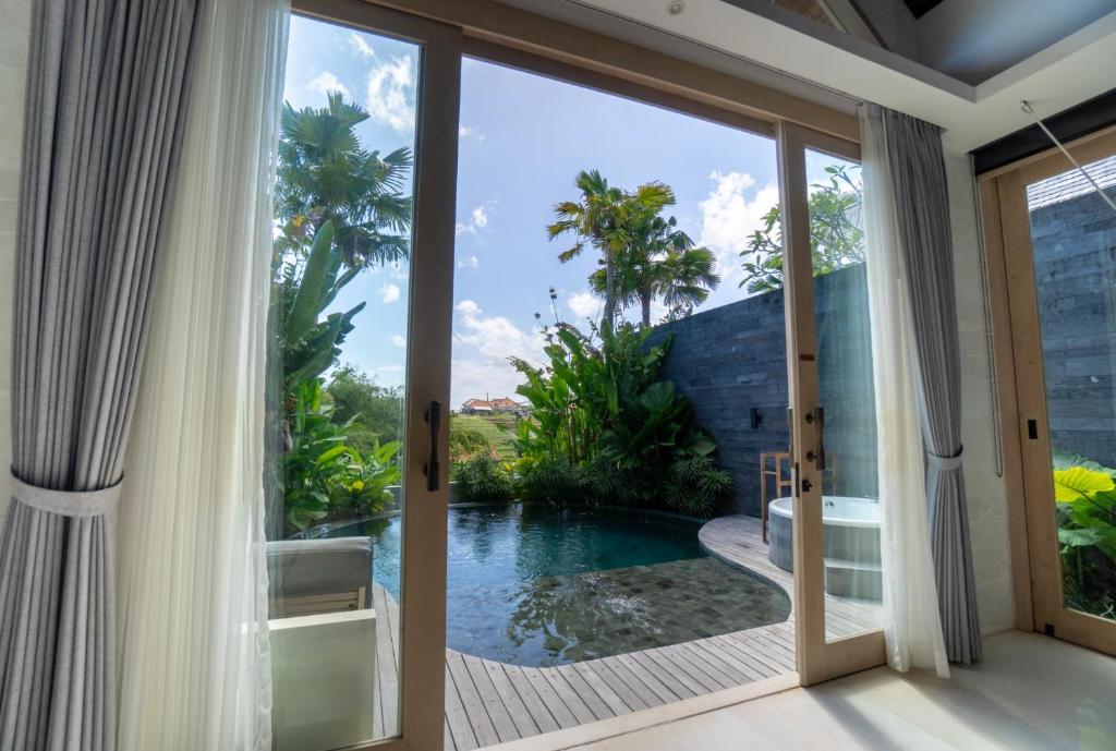 Bazén v ubytování Astera Luxury Resort & Spa Canggu by Ini Vie Hospitality nebo v jeho okolí