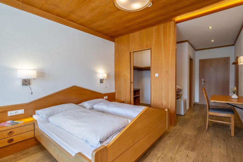 Postel nebo postele na pokoji v ubytování Hotel Panorama