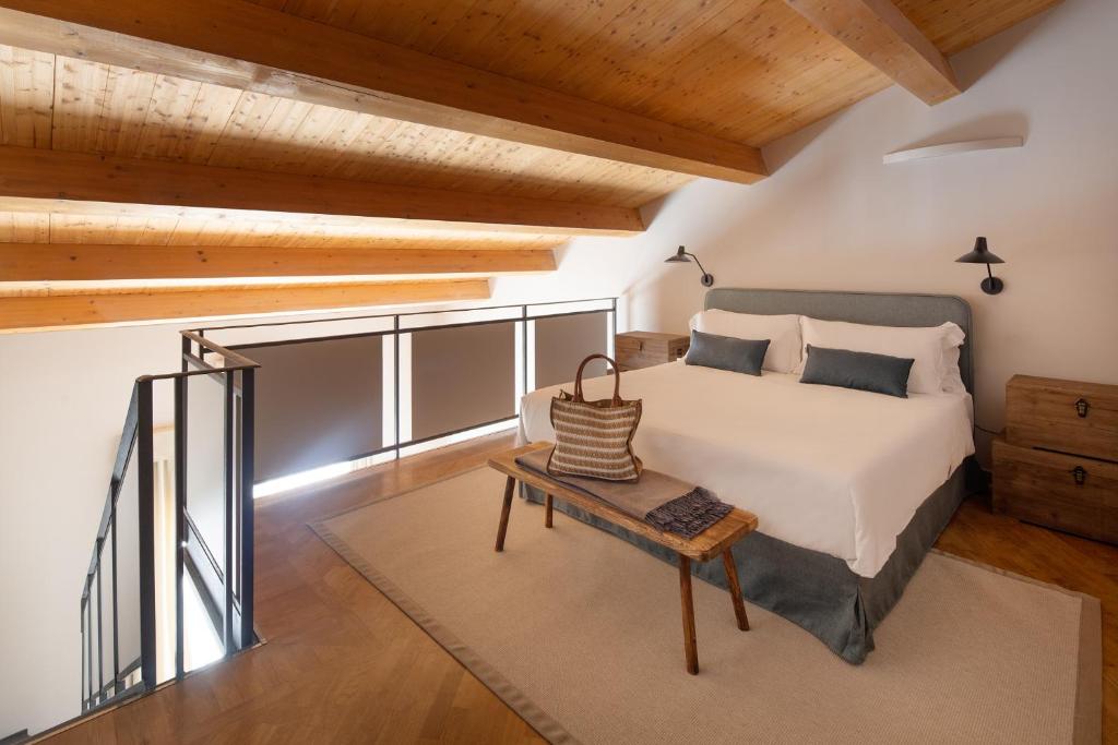 Postel nebo postele na pokoji v ubytování Precise Tale Poggio Alla Sala