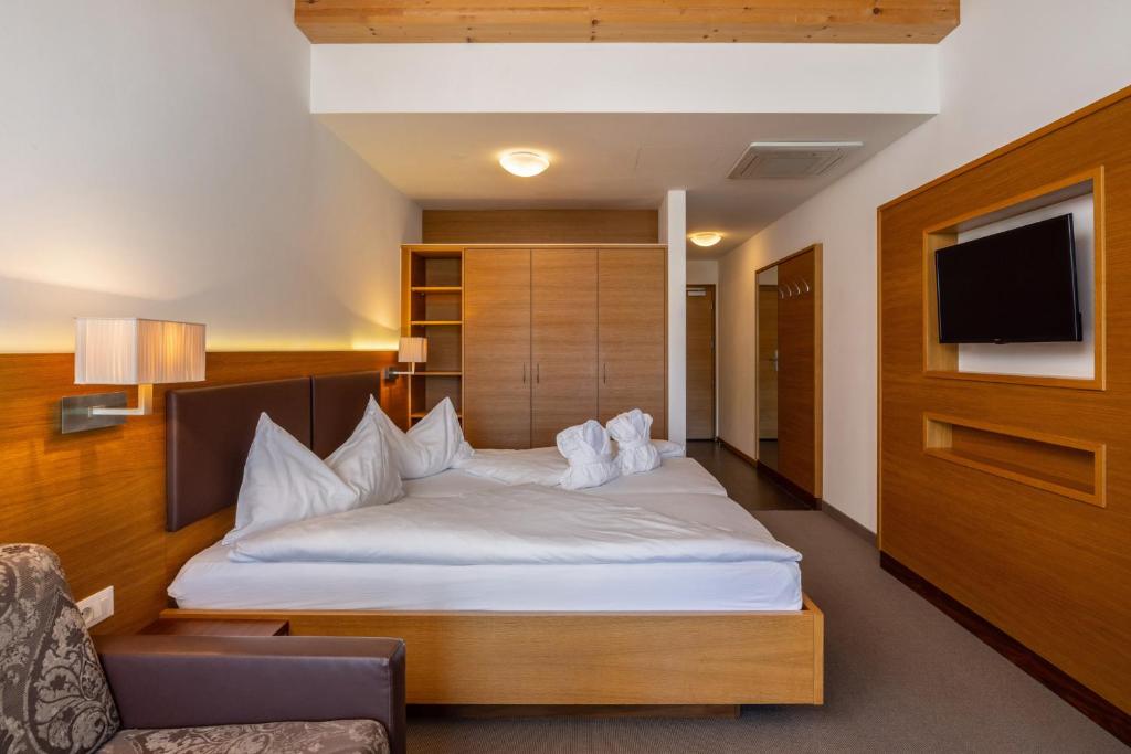Postel nebo postele na pokoji v ubytování Hotel Panorama
