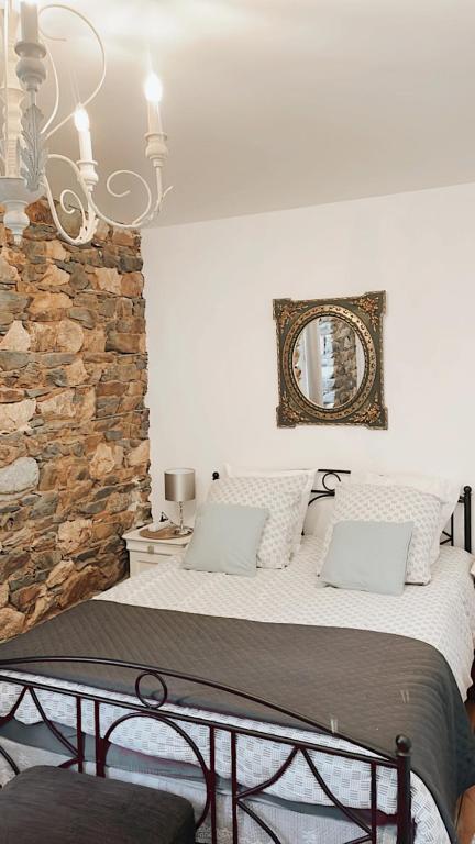Postel nebo postele na pokoji v ubytování Ar Maen Gite et Chambres d'hotes