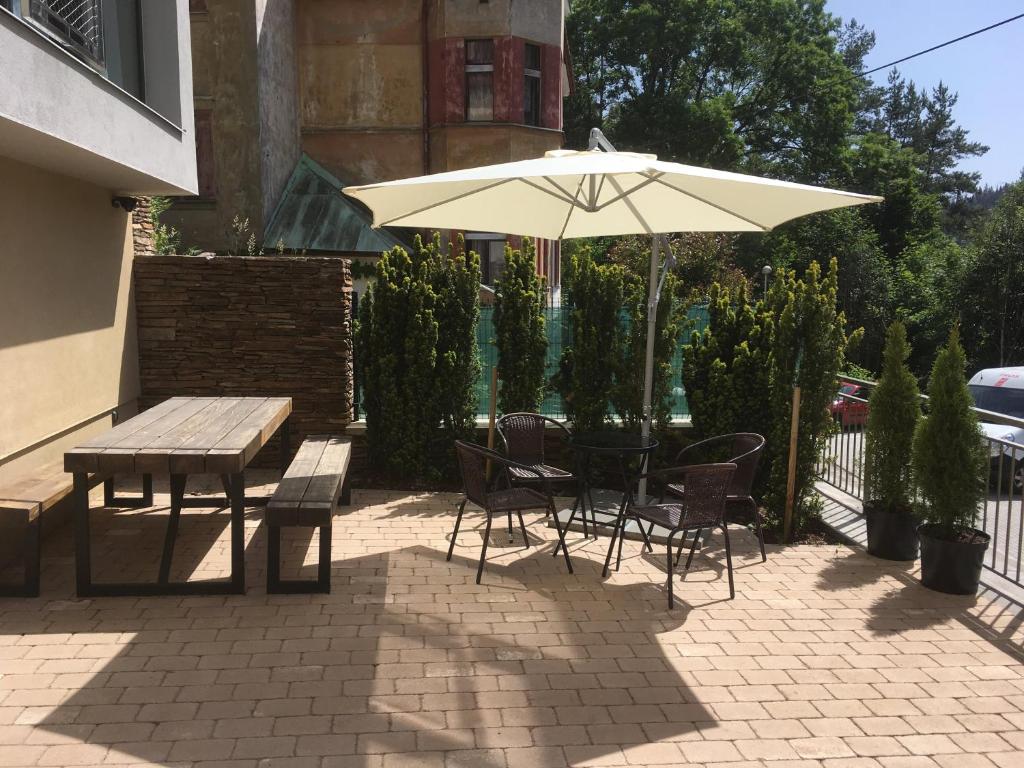 Patio nebo venkovní prostory v ubytování APARTMÁNY ADAM