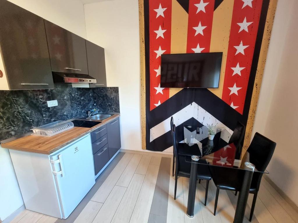 Kuchyň nebo kuchyňský kout v ubytování ArtRock Residence