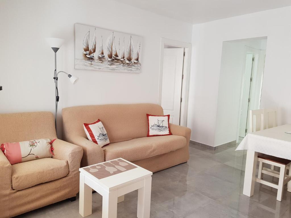 Posedenie v ubytovaní Apartamentos Bajel