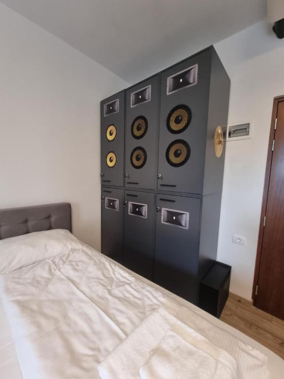 Postel nebo postele na pokoji v ubytování ArtRock Residence