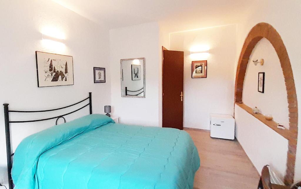 Postel nebo postele na pokoji v ubytování Borgo de' Muracci