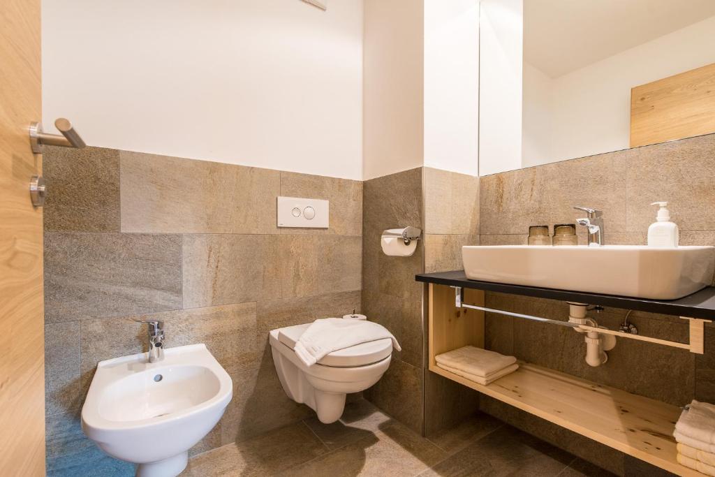 Koupelna v ubytování Hotel Antholzerhof