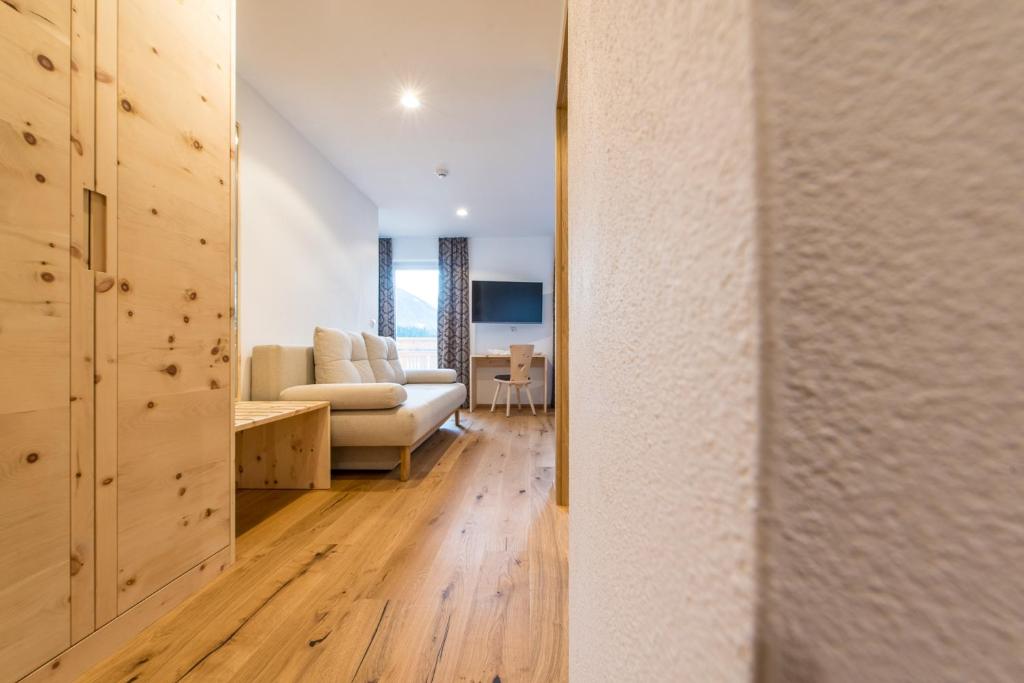 Postel nebo postele na pokoji v ubytování Hotel Antholzerhof