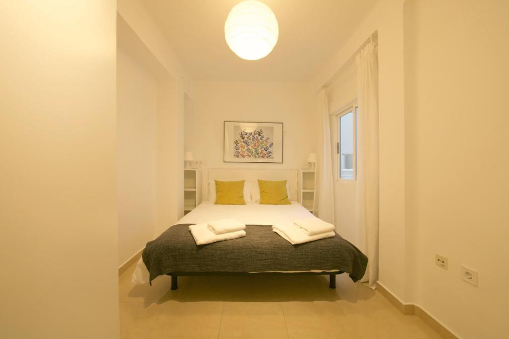 Posteľ alebo postele v izbe v ubytovaní FUN BUILDING FLATS by HOMEABOUT
