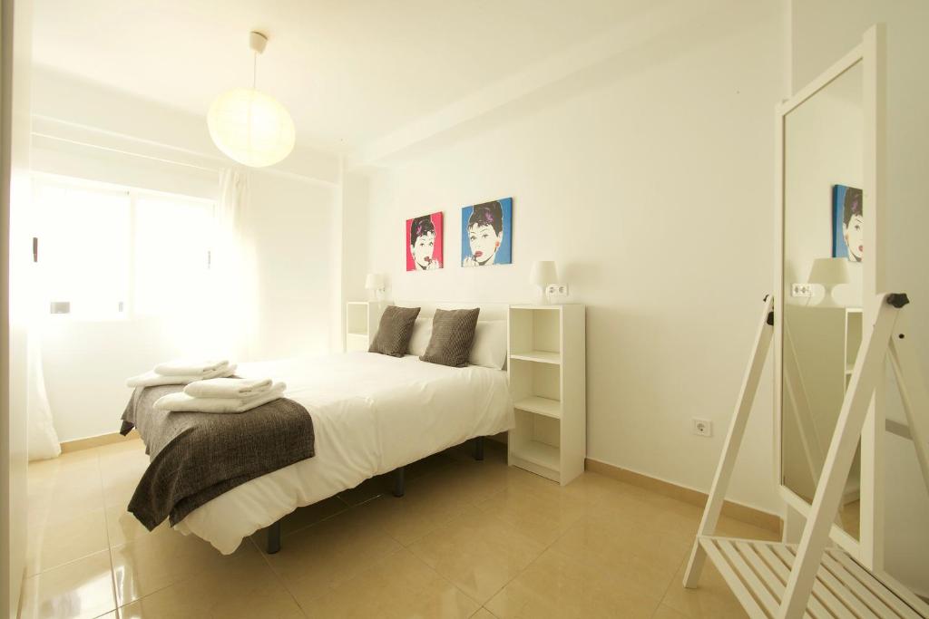 Posteľ alebo postele v izbe v ubytovaní FUN BUILDING FLATS by HOMEABOUT
