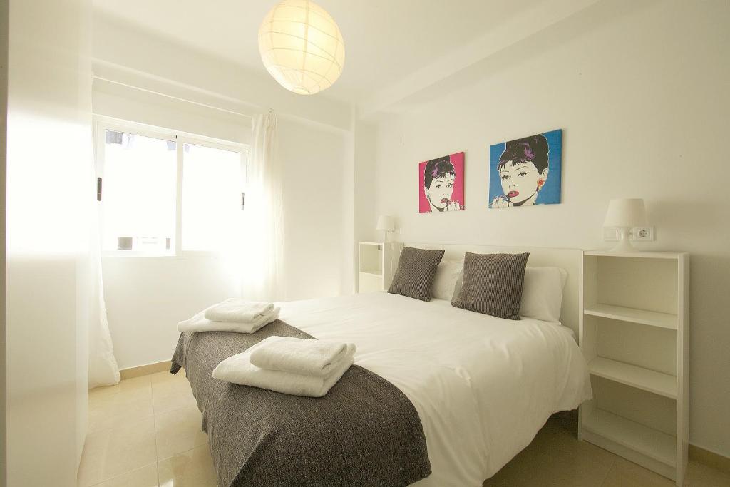 Posteľ alebo postele v izbe v ubytovaní FUN BUILDING FLATS by HOMEABOUT