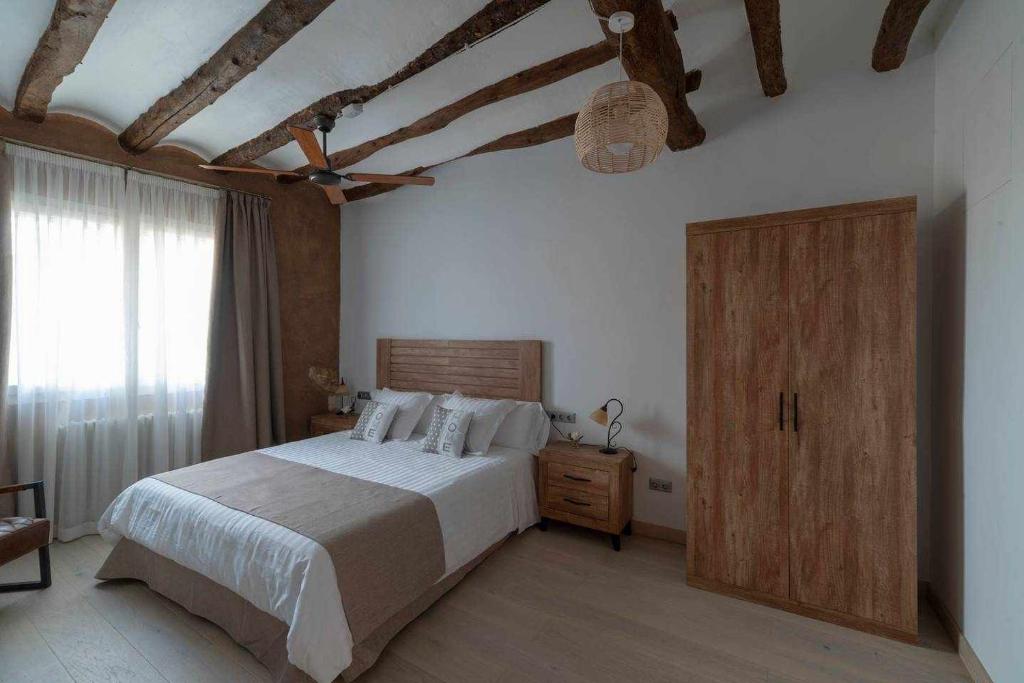 Posteľ alebo postele v izbe v ubytovaní Casa de ensueño en Almatret
