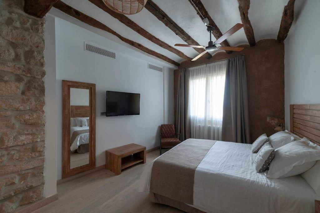 Posteľ alebo postele v izbe v ubytovaní Casa de ensueño en Almatret