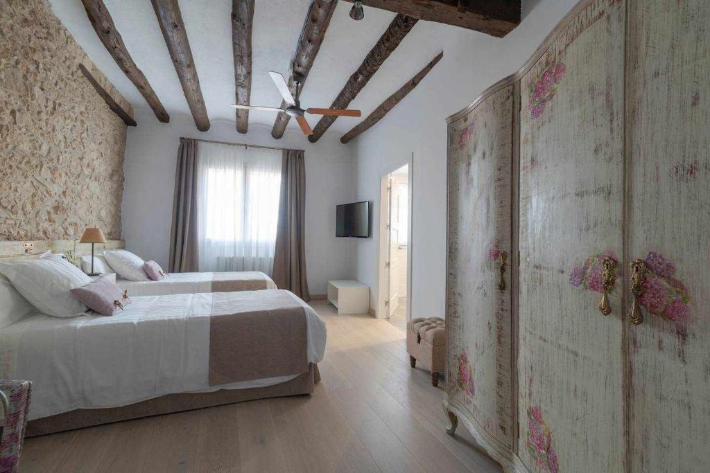 Posteľ alebo postele v izbe v ubytovaní Casa de ensueño en Almatret