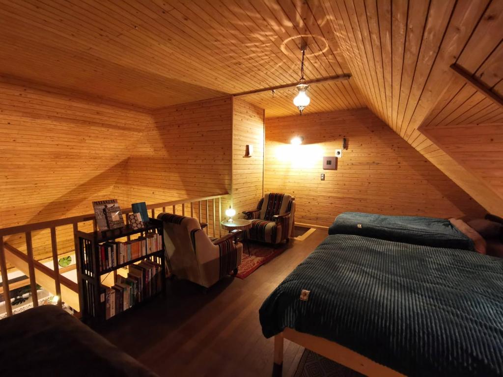 Postel nebo postele na pokoji v ubytování 星空に包まれる 森の隠れ家　Amrita Lodge ~stay & retreat~