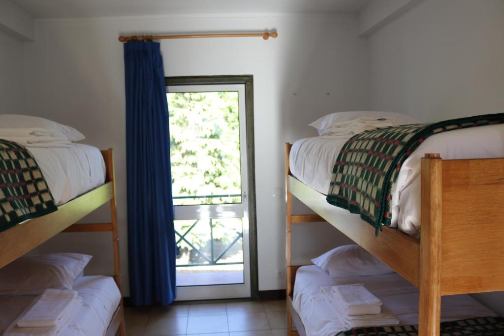 Postel nebo postele na pokoji v ubytování HI Guarda - Pousada de Juventude