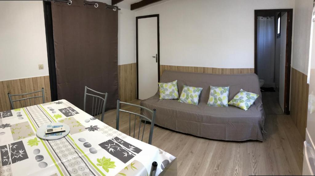 Postel nebo postele na pokoji v ubytování Camping Trinité