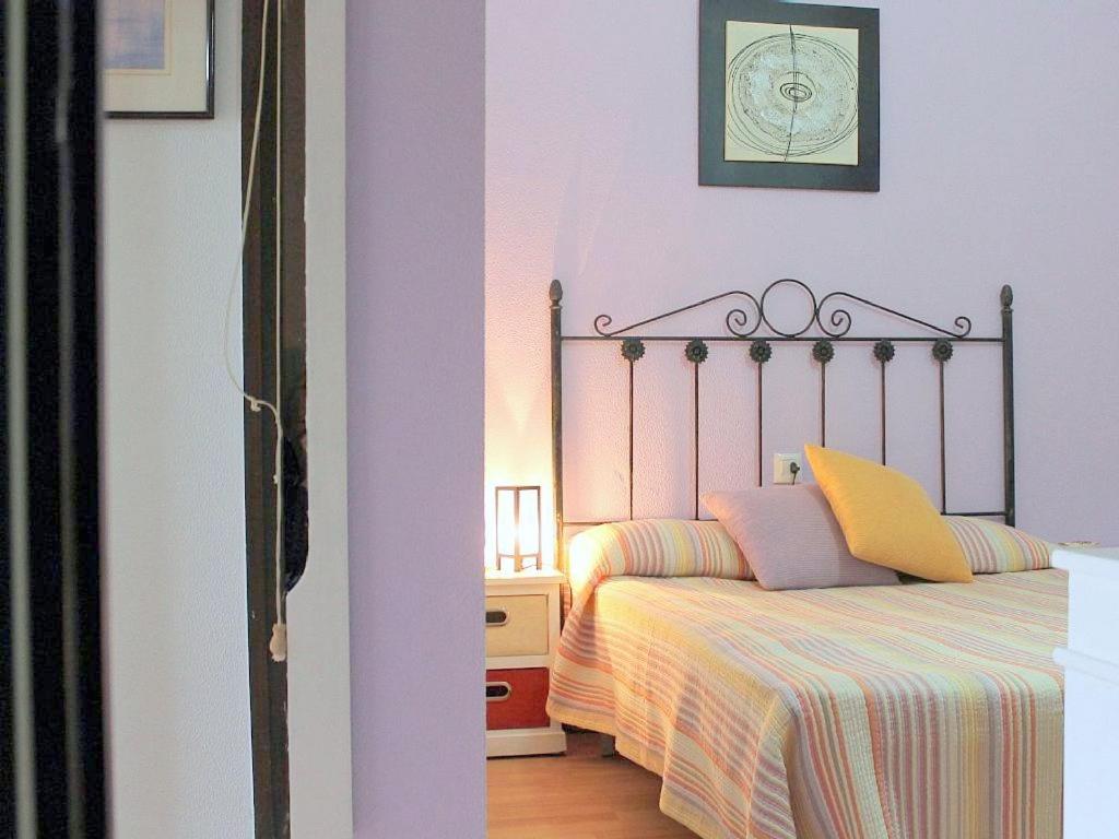 Postel nebo postele na pokoji v ubytování Empurialola - Precioso apartamento vistas a los canales en Empuriabrava- 146