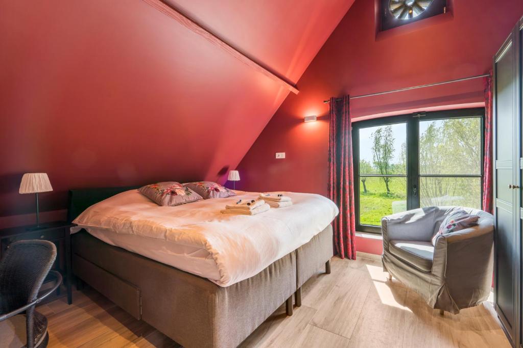 Postel nebo postele na pokoji v ubytování Hoeve De Zuidhoek