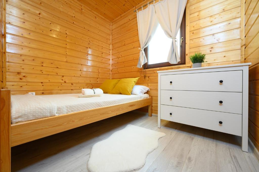 Postel nebo postele na pokoji v ubytování Boho Baltic Resort