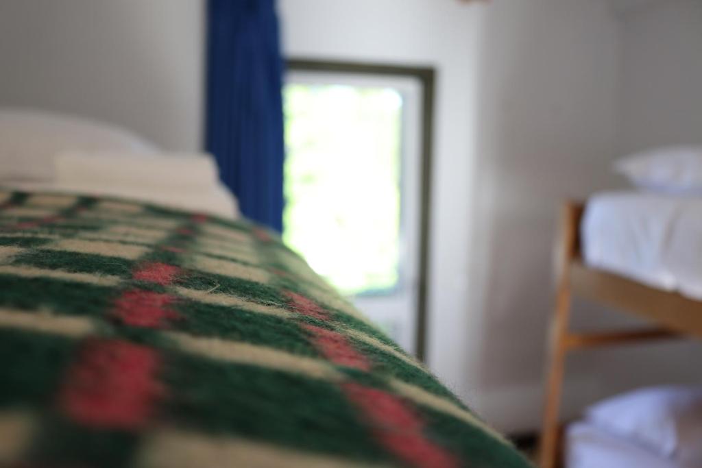 Postel nebo postele na pokoji v ubytování HI Guarda - Pousada de Juventude