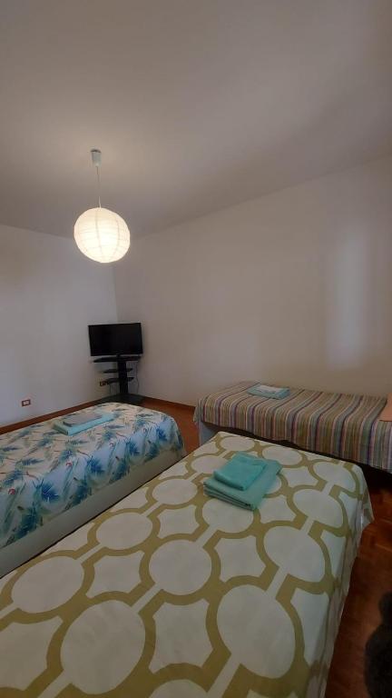 Postel nebo postele na pokoji v ubytování Cormons Bellissima
