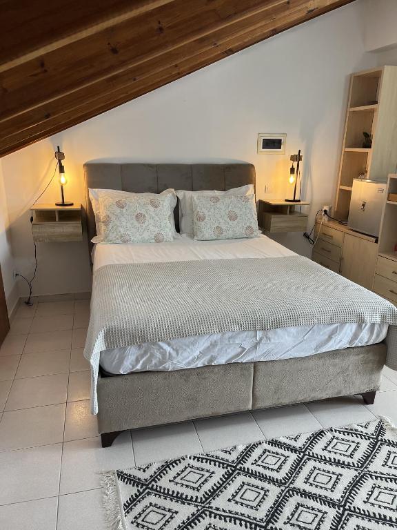 Postel nebo postele na pokoji v ubytování Sea View Loft