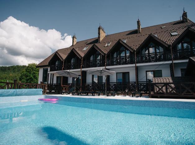 Bazén v ubytování RUBEL APARTHOTEL&SPA nebo v jeho okolí