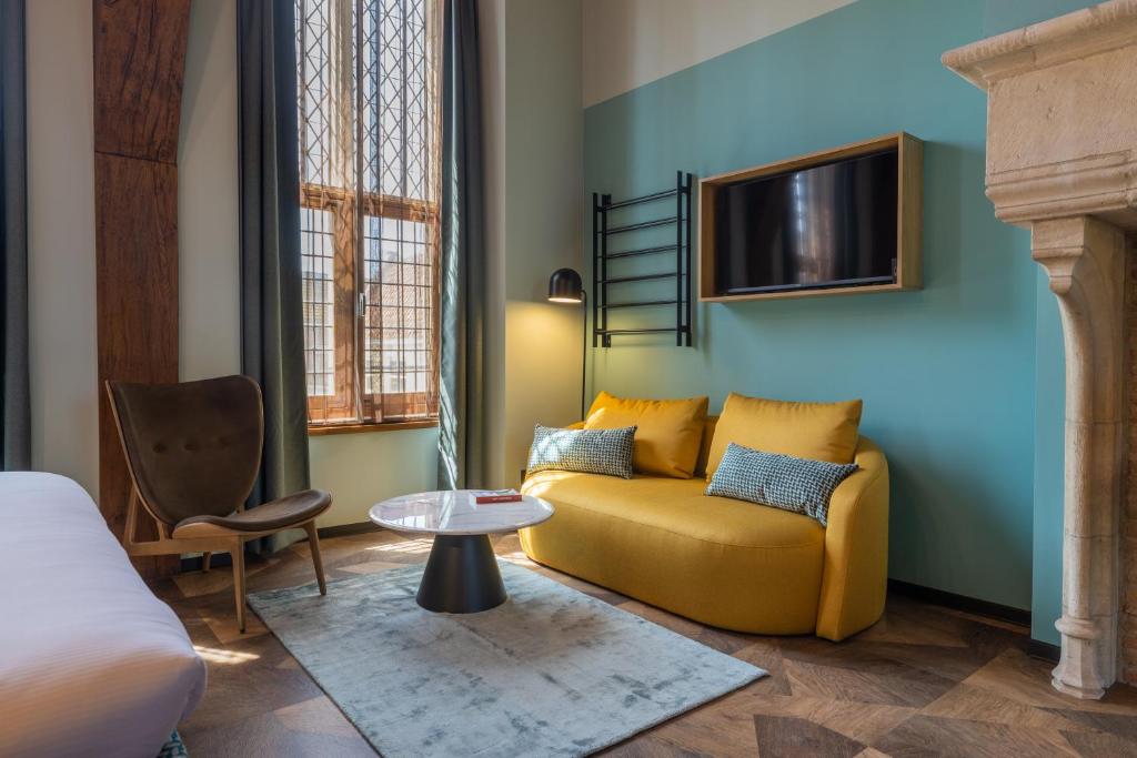 Posezení v ubytování Hotel St Joris I Kloeg Collection