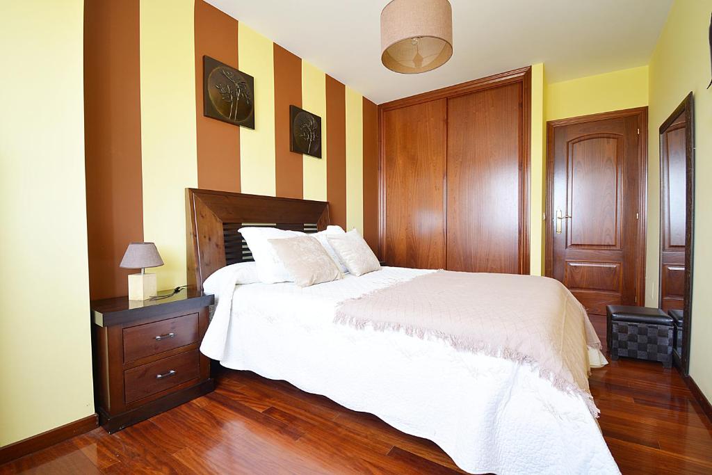 Postel nebo postele na pokoji v ubytování Apartamento próximo a la Playa de A Lanzada