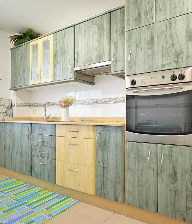 Kuchyň nebo kuchyňský kout v ubytování Apartamento próximo a la Playa de A Lanzada