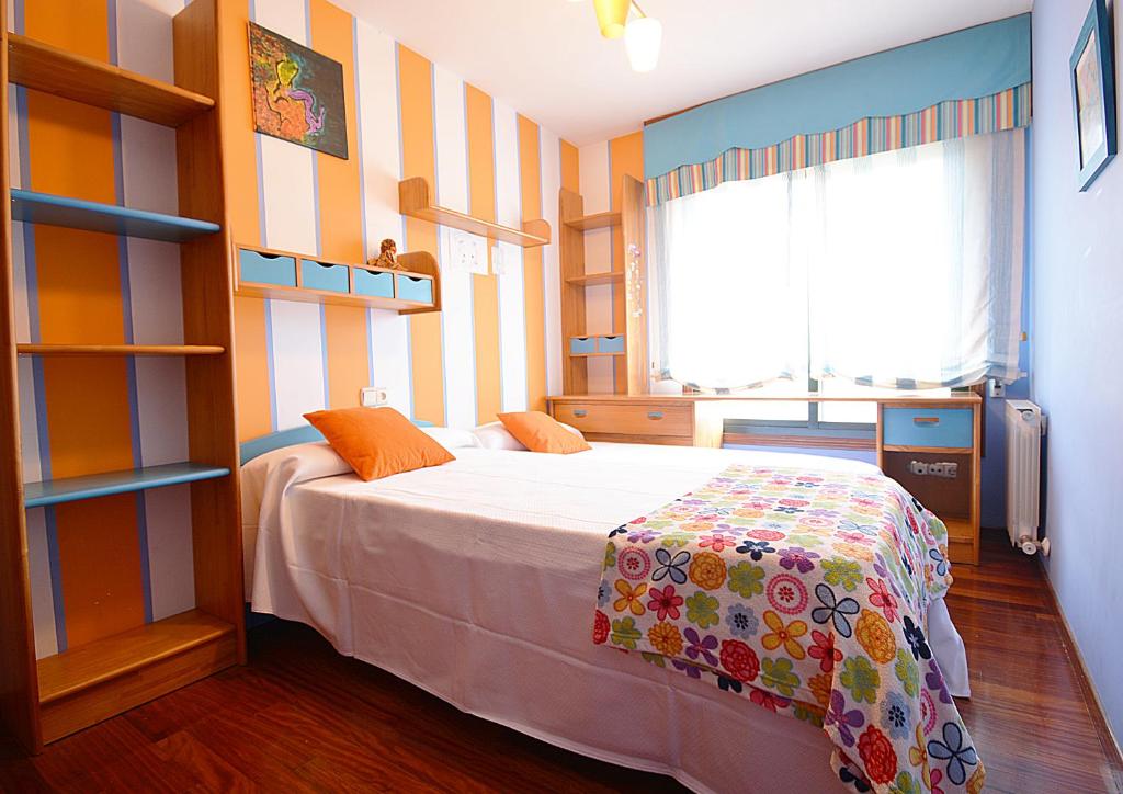 Postel nebo postele na pokoji v ubytování Apartamento próximo a la Playa de A Lanzada