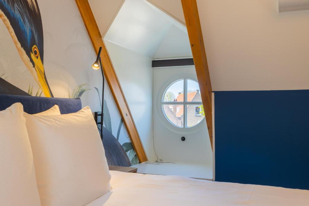 Postel nebo postele na pokoji v ubytování Hotel St Joris I Kloeg Collection