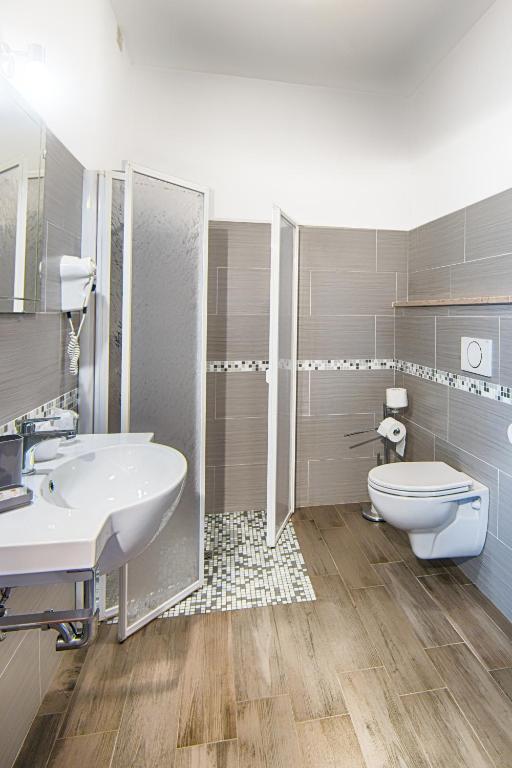 Koupelna v ubytování Hotel Raimondi