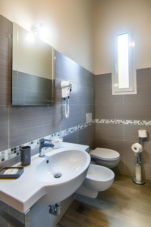 Koupelna v ubytování Hotel Raimondi