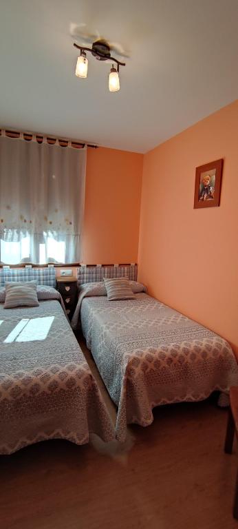 Postel nebo postele na pokoji v ubytování Casa Cote